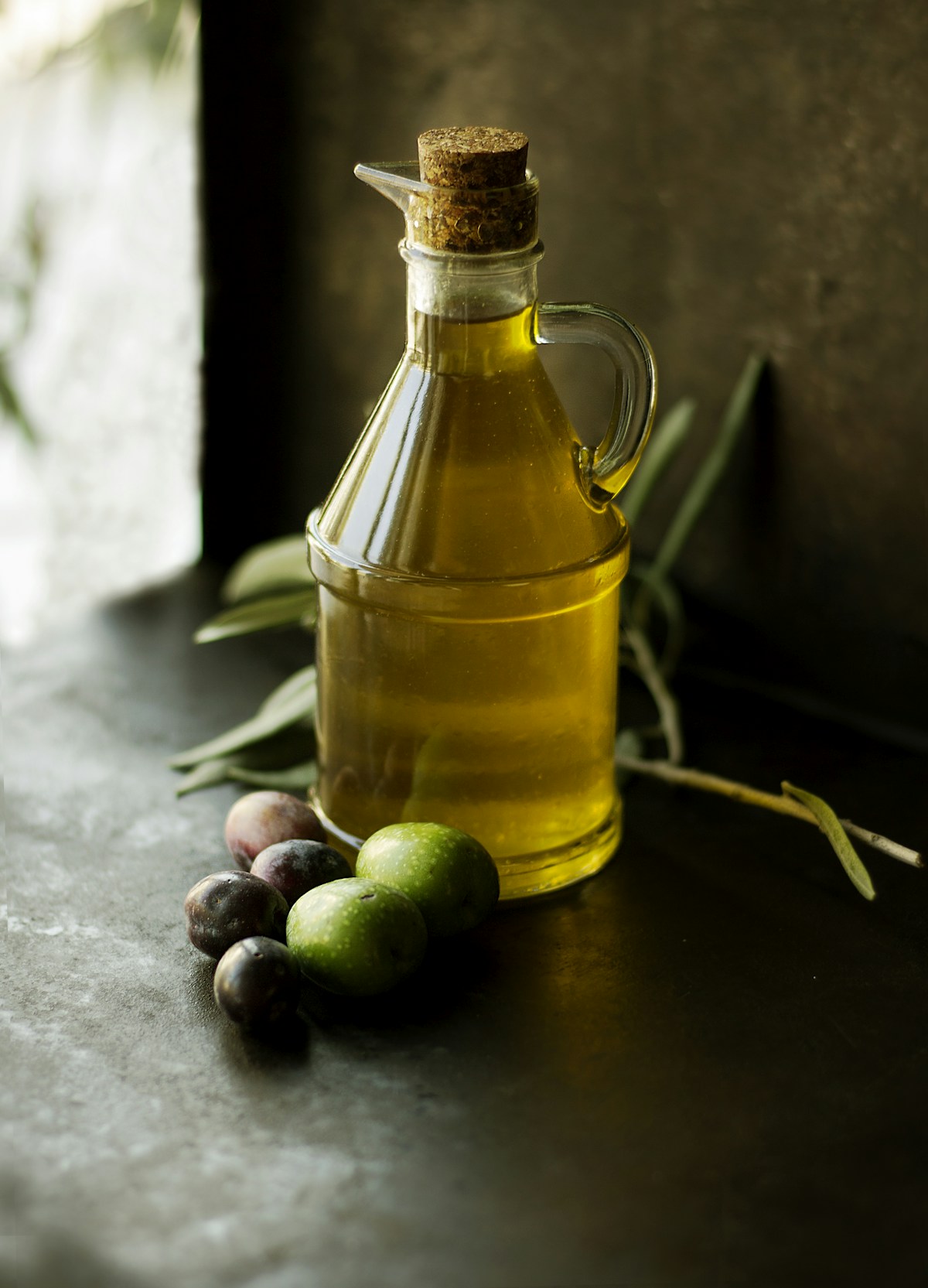 Olive oil and pantry staples on shelves